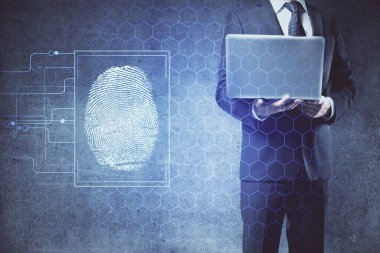 Arka planda bilgisayar üzerinde çalışan iş adamı ile parmak izi hologramı. Güvenlik kavramı. Çift pozlama.