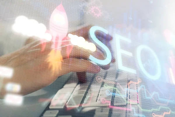 Multi exposure of seo icon with man working on computer on background. Concept of search engine optimization. — Stock Photo, Image