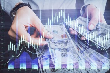 Finansal grafiğe çoklu pozlama hologram, Amerikan dolarları ve insan eli. Analiz kavramı.