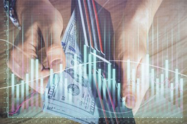 Forx grafiği, hologram, Amerikan dolarları ve insan eli çizimleri. Teknik Analiz kavramı.