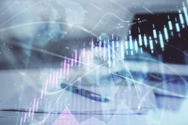 Finansal grafik çizimleri ve açık defter arkaplanı olan bir masa. Önx pazarı kavramı