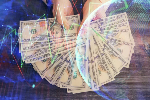 Multi exposure of financial graph drawing hologram and USA dollars bills and man hands. Analysis concept. — Stock Photo, Image