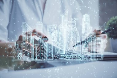 Not defterine el yazısının üzerini çiziyor. Akıllı ev kavramı. Çoklu pozlama