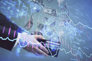 Finansal grafiğe çoklu pozlama hologram, Amerikan dolarları ve insan eli. Analiz kavramı.
