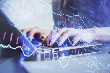 Bilgisayarda ve ön x grafik hologram çiziminde kadın eli yazarken çift pozlama. Borsa yatırım kavramı.