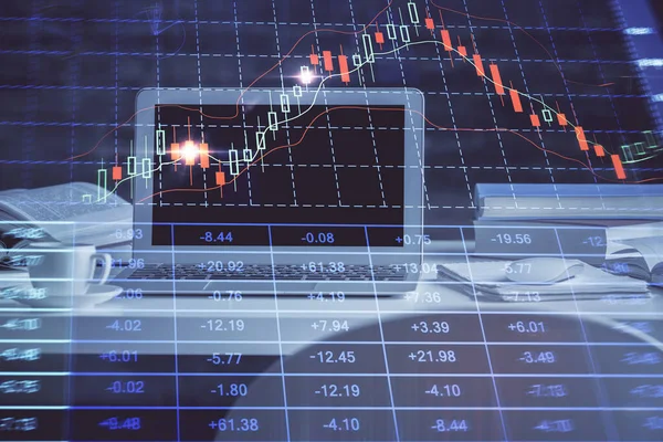 Financial market graph hologram and personal computer on background. Multi exposure. Concept of forex.