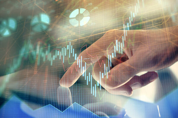 Multi exposure of mans hands holding and using a phone and financial chart drawing. Market analysis concept.