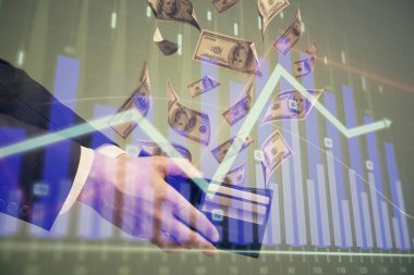 Finansal grafiğe çoklu pozlama hologram, Amerikan dolarları ve insan eli. Analiz kavramı.