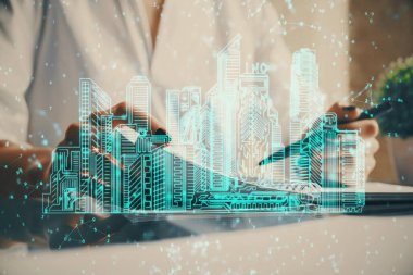 Not defterine el yazısının üzerini çiziyor. Akıllı ev kavramı. Çoklu pozlama