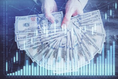 Finansal grafiğe çoklu pozlama hologram, Amerikan dolarları ve insan eli. Analiz kavramı.