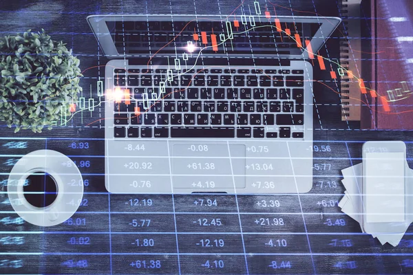 Stock market chart and top view computer on the table background. Double exposure. Concept of financial analysis. — Stock Photo, Image