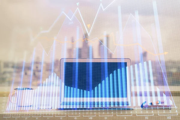 Financial market graph hologram and personal computer on background. Multi exposure. Concept of forex.