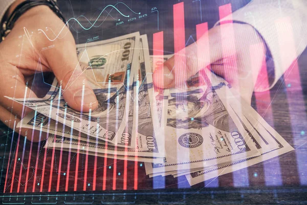 Multi blootstelling van de financiële grafiek tekenen hologram en Amerikaanse dollars rekeningen en man handen. Analyse concept. — Stockfoto