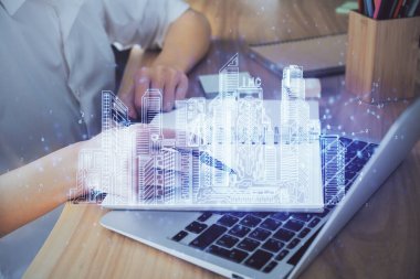 Not defterine el yazısının üzerini çiziyor. Akıllı ev kavramı. Çoklu pozlama