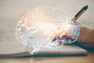 Arka planda beyin hologramıyla el yazısının iki katına çıkarılması. Öğrenme kavramı.