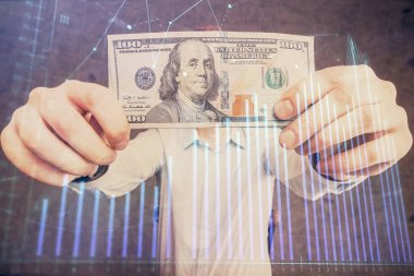 Forx grafiği, hologram, Amerikan dolarları ve insan eli çizimleri. Teknik Analiz kavramı.