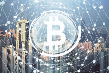 Kripto para birimi temalı hologram çizimi ve şehrin veiw arka planına çift pozlama. Engelleme zinciri ve bitcoin kavramı.
