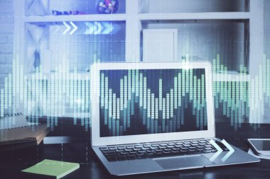 Arka planda eski pazar grafik hologramı ve kişisel bilgisayar var. Çifte maruziyet. Yatırım kavramı.