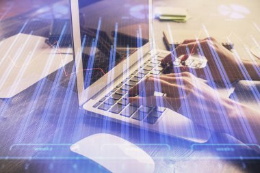 Bilgisayarda ve ön x grafik hologram çiziminde kadın eli yazarken çift pozlama. Borsa yatırım kavramı.