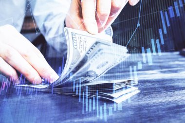 Forx grafiği, hologram, Amerikan dolarları ve insan eli çizimleri. Teknik Analiz kavramı.