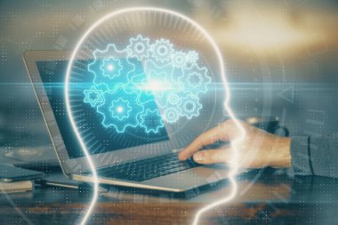 Adam klavyede beyin hologramıyla yazı yazıyor. Büyük Data kavramı. Çift pozlama.