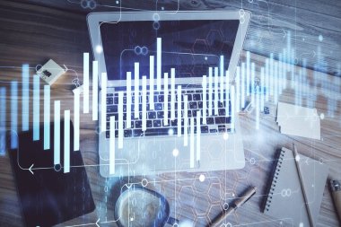 Bilgisayarla arka plan üzerine iki kat mali şema çizimi. Araştırma ve analiz kavramı. Üst görünüm.