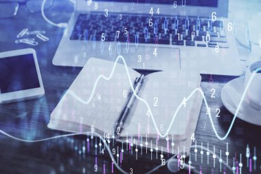 Finansal grafik çizimleri ve açık defter arkaplanı olan masalara çoklu pozlama. Önx kavramı