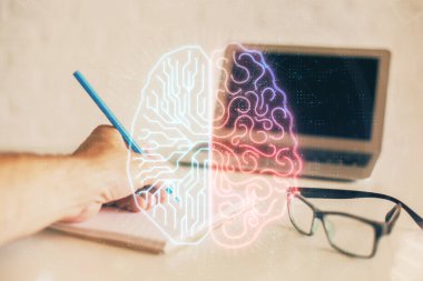 Beyni çift taraflı çalışan bir adamın elleri. İnsan öğrenme kavramı.