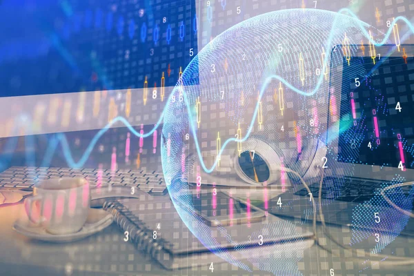 Double exposure of graph and financial info and work space with computer background. Concept of international online trading.