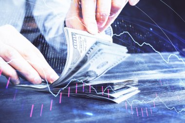 Forx grafiği, hologram, Amerikan dolarları ve insan eli çizimleri. Teknik Analiz kavramı.