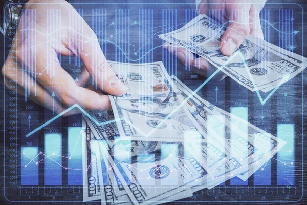 Finansal grafiğe çoklu pozlama hologram, Amerikan dolarları ve insan eli. Analiz kavramı.