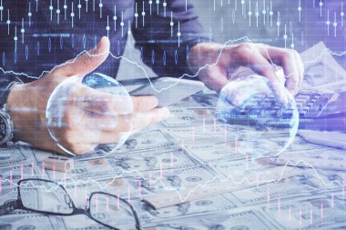 Bir adamın elini tutarken ve dijital bir cihaz ve ön grafik çizimi kullanırken çift pozlama. Finansal piyasa kavramı.