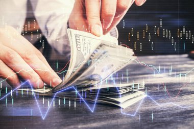 Forx grafiği, hologram, Amerikan dolarları ve insan eli çizimleri. Teknik Analiz kavramı.