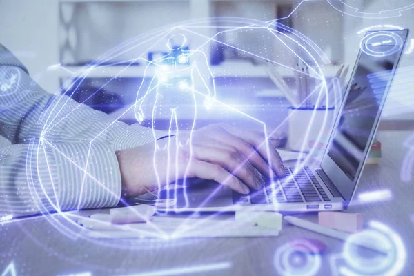 Science hologram with man working on computer on background. Concept of study. Double exposure.