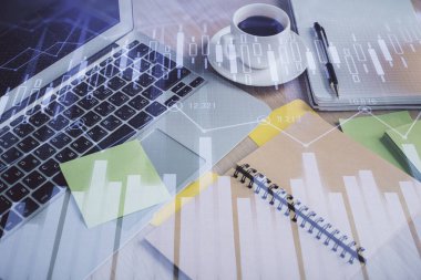 Önx grafik çizimi ve masaüstü ile kahve ve masa arkasındaki öğelerin çoklu pozlandırılması. Finansal piyasa ticareti kavramı