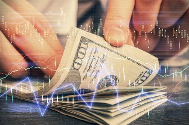 Forx grafiği, hologram, Amerikan dolarları ve insan eli çizimleri. Teknik Analiz kavramı.