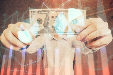 Forx grafiği, hologram, Amerikan dolarları ve insan eli çizimleri. Teknik Analiz kavramı.