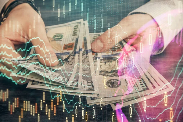 Finansal grafiğe çoklu pozlama hologram, Amerikan dolarları ve insan eli. Analiz kavramı.