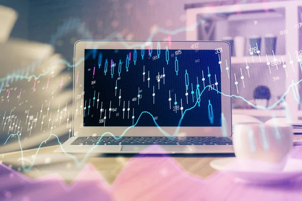 Financial market graph hologram and personal computer on background. Double exposure. Concept of forex.