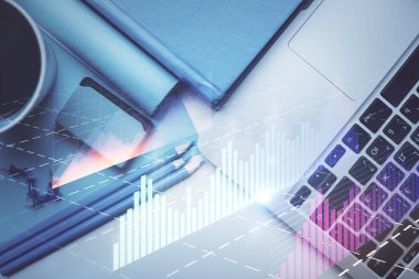 Bilgisayarla masaüstü arkaplanı üzerinde ön x grafik çizimi çift pozlama. Finansal analiz kavramı. Üst görünüm.