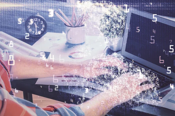 Technology theme hologram with man working on computer on background. High tech concept. Multi exposure.