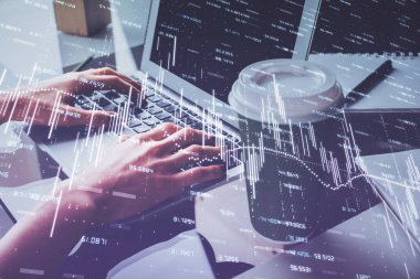 Bilgisayarda ve ön x grafik hologram çiziminde kadın eli yazarken çift pozlama. Borsa yatırım kavramı.