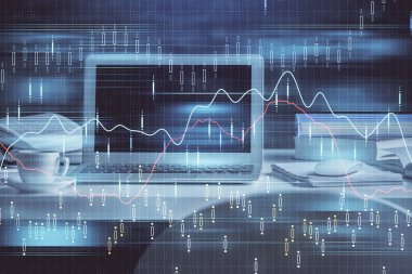 Finansal grafik renkli çizimler ve arka planda bilgisayar olan tablolar. Çifte maruziyet. Uluslararası pazarlar kavramı.