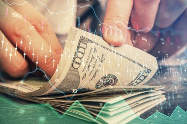 Forx grafiği, hologram, Amerikan dolarları ve insan eli çizimleri. Teknik Analiz kavramı.
