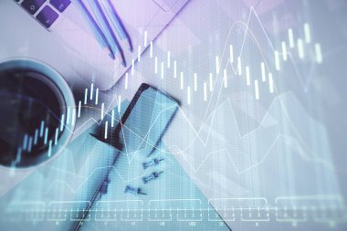 Bilgisayarla masaüstü arkaplanı üzerinde ön x grafik çizimi çift pozlama. Finansal analiz kavramı. Üst görünüm.