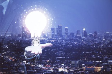 Ampul hologram çizimine ve şehir manzarasına çoklu maruz kalma. Fikir kavramı.