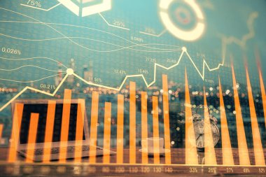 Finansal grafik renkli çizimler ve arka planda bilgisayar olan tablolar. Çoklu maruz kalma. Uluslararası pazarlar kavramı.