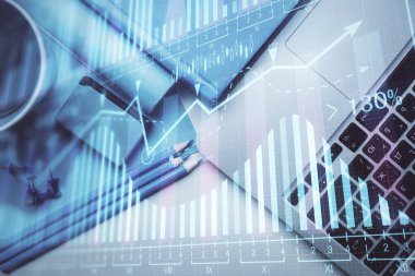 Bilgisayarla masaüstü arkaplanı üzerinde ön x grafik çizimi çift pozlama. Finansal analiz kavramı. Üst görünüm.