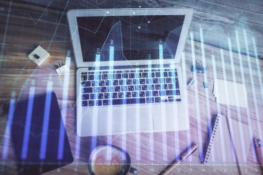 Bilgisayarla arka plan üzerine iki kat mali şema çizimi. Araştırma ve analiz kavramı. Üst görünüm.