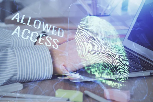 Fingeravtryck hologram med affärsman som arbetar på dator på bakgrunden. Säkerhetskoncept. Dubbel exponering. — Stockfoto